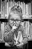 Books - little girl with glasses shushing noisy people.jpg
