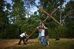 RallyoftheRebelBrigadeKnightsoftheKuKluxKlanraiseahomecadecrossfornighttimecrosslightingceremonyinMartinsvilleVirginiaUSAJul_zps46169c3d.jpg