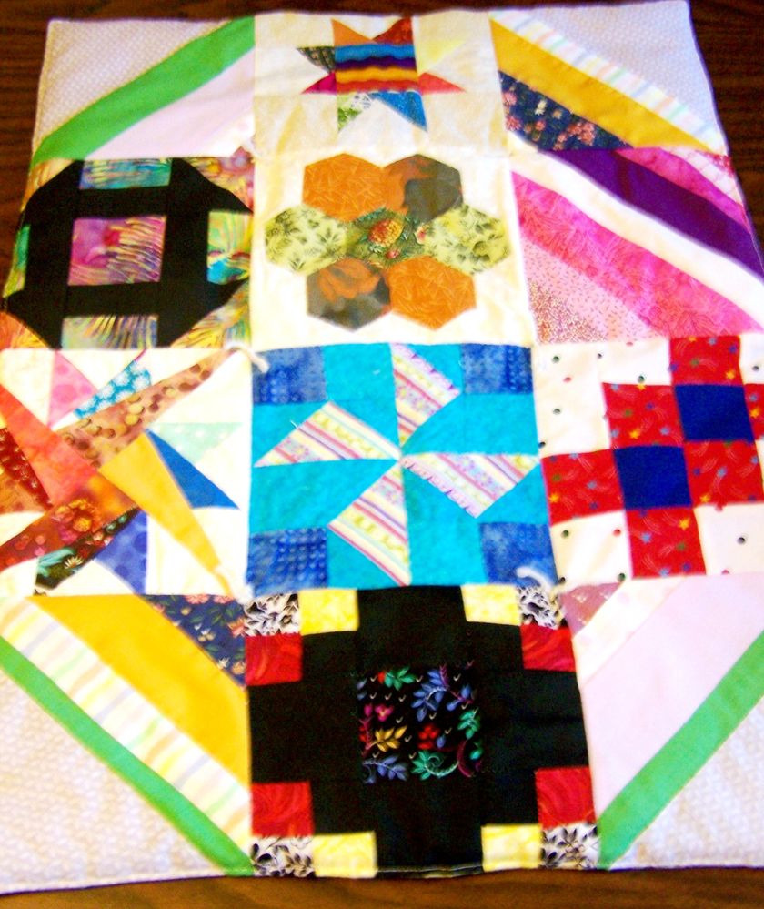 sampler doll quilt.JPG