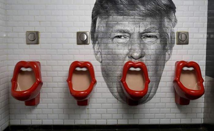 someone-added-donald-trump-to-the-wall-of-this-restroom-in-paris__700.jpg