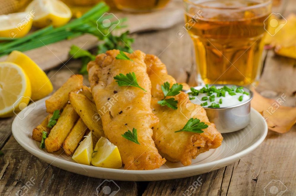 45370076-fish-and-chips-fish-wrapped-in-beer-batter-herbs-dip-and-czech-beer.jpg