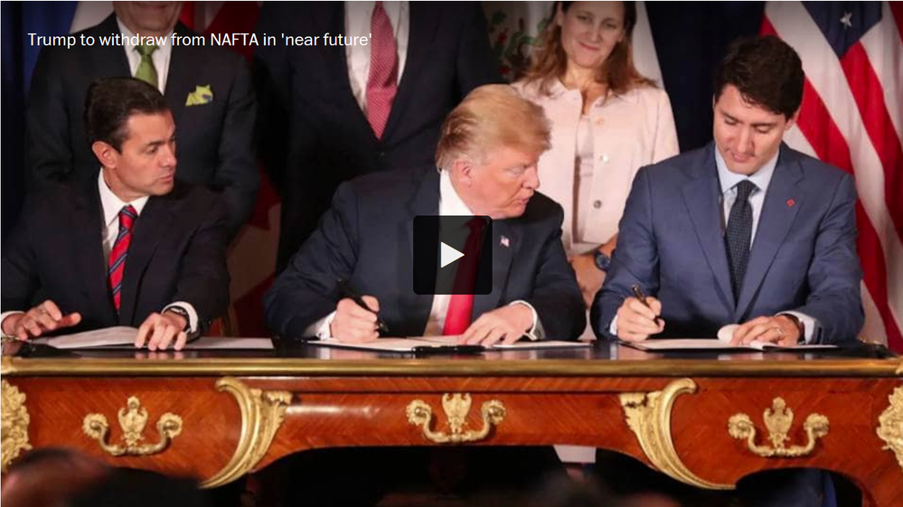 Trump signing NAFTA.png