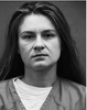 bUTINA ARRESTED.png