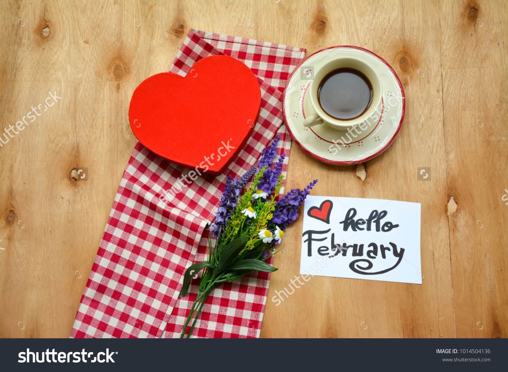 stock-photo-a-cup-of-coffee-and-a-note-with-hello-february-text-on-rustic-wooden-table-and-lavender-flowers-1014504136.jpg