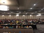 One of the two nightly auctions of items in the foreground