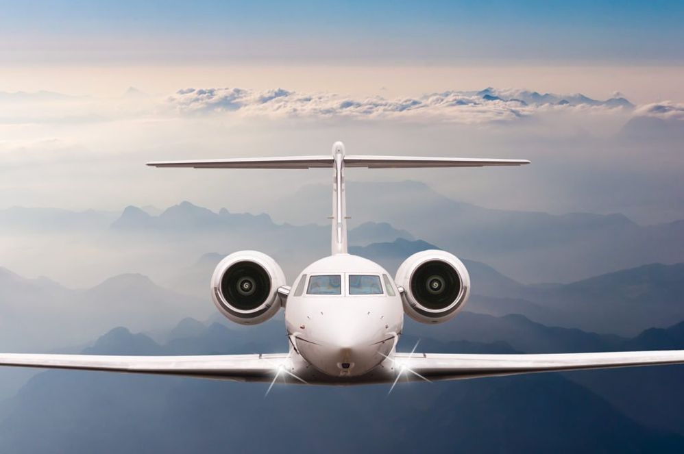 Front-view-of-aircraft-in-flight.-The-passenger-plane-flies-high-above-the-clouds-1024x680.jpg