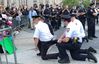 200612-robert-cattani-nypd-blm-protest-taking-a-knee-one-time-use-only-se-118p_2aa44d7d0998be5c6939ba83ac50aec2.fit-2000w.jpg
