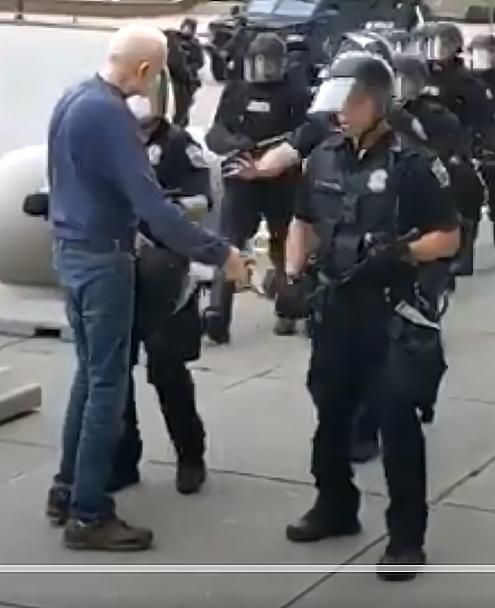 ProtestorCellPhone.jpg