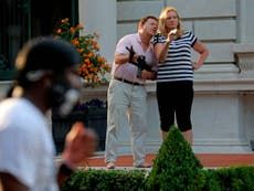 St-Louis-couple-guns.jpg
