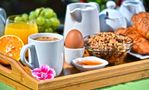 breakfast-served-coffee-juice-croissants-fruits-orange-cereals-garden-95336493.jpg