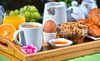 breakfast-served-coffee-juice-croissants-fruits-orange-cereals-garden-95336493.jpg