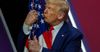 b22ae3001f142a69a0b671243386797f15-29-president-trump-american-flag-cpac-20.rsocial.w1200.jpg