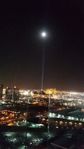 THE LIGHT FROM LUXUR SHINING UP TO FULL MOON ON 6-13-14.jpg
