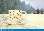 hot-winter-drink-warm-scarf-near-window-view-snowy-forest-153040100.jpg