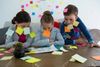 83441524-kids-as-business-executives-playing-with-sticky-notes-in-office.jpg