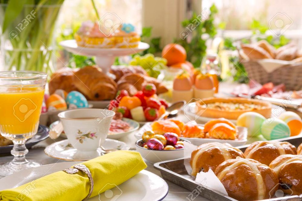 93561821-breakfast-or-brunch-table-filled-with-all-sorts-of-delicious-delicatessen-ready-for-an-easter-meal-.jpg