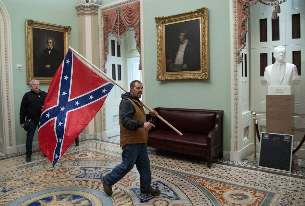 rioter w confed flag.jpg