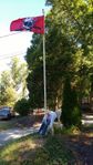 The original drunk Dora. (Dora sat at a flagpole between 2 driveways.)  Couldn't even keep her head up. (2017)