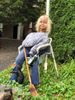 The reincarnated Dora or Dora II or Blondie. (Had to run out between the rain to get a picture on her throne.  Her boobs have suffered some obvious slippage. ) (2021)