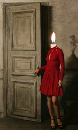 woman in red dress with flame for a head caption this.png