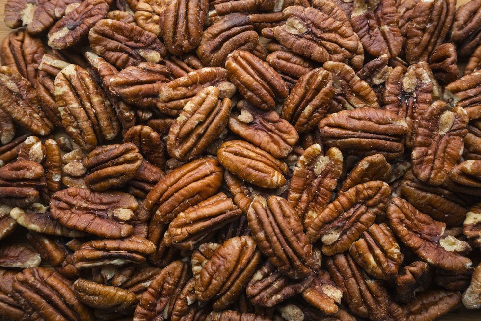 pile-of-pecans-royalty-free-image-672151137-1559590504.jpg