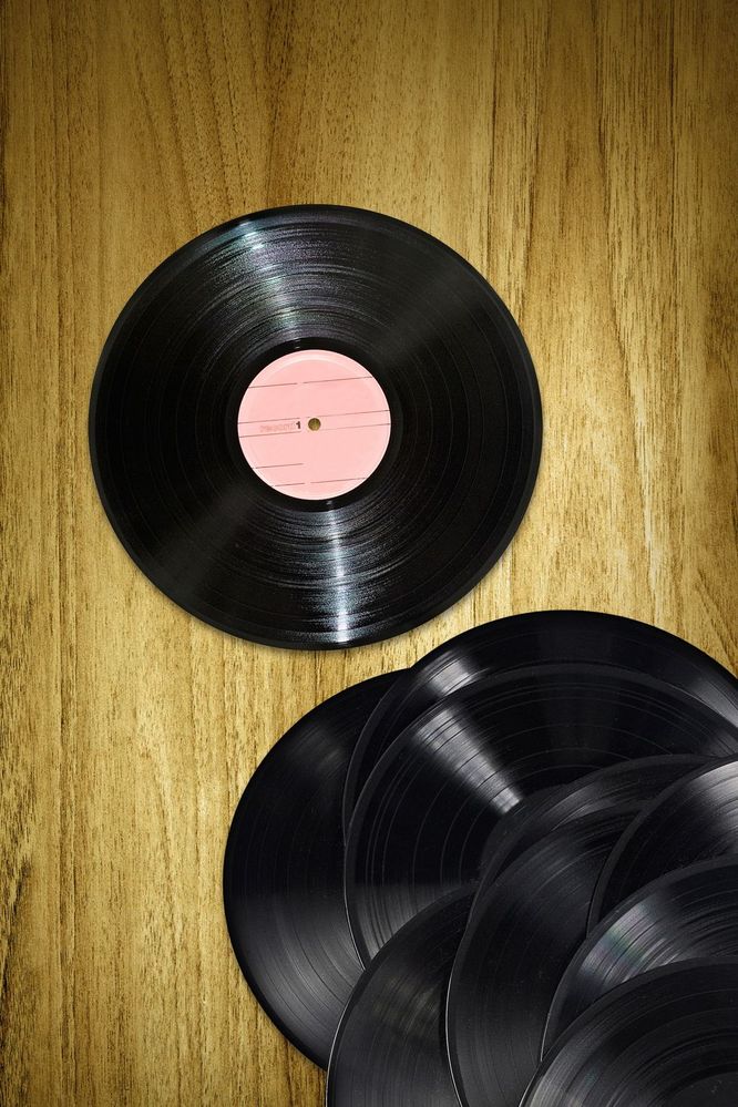 vinyl-records-on-desk-royalty-free-image-1583276668.jpg